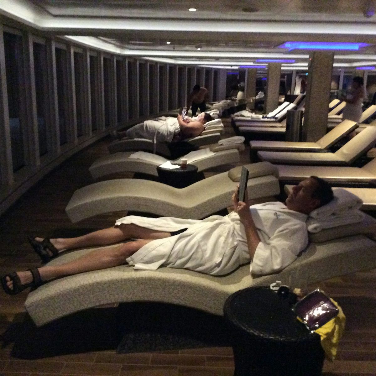 Relaxing on hot beds in the thermal suite