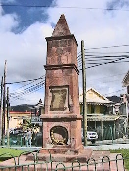 Roseau Dominica war memorial The Cenotaph junction Dame Mary Eugenia Charles Blvd, Victoria Street, view between Castle Street & Turkey Lane background