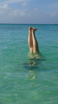 Hand stand in the sea
