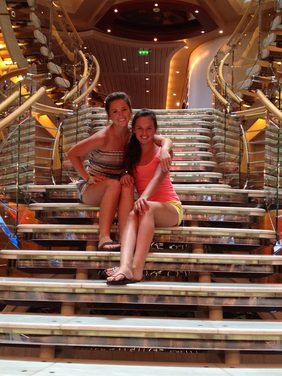 Daughters posing on beautiful staircase.
