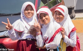 Three happy girls in Ternate, Indonesia