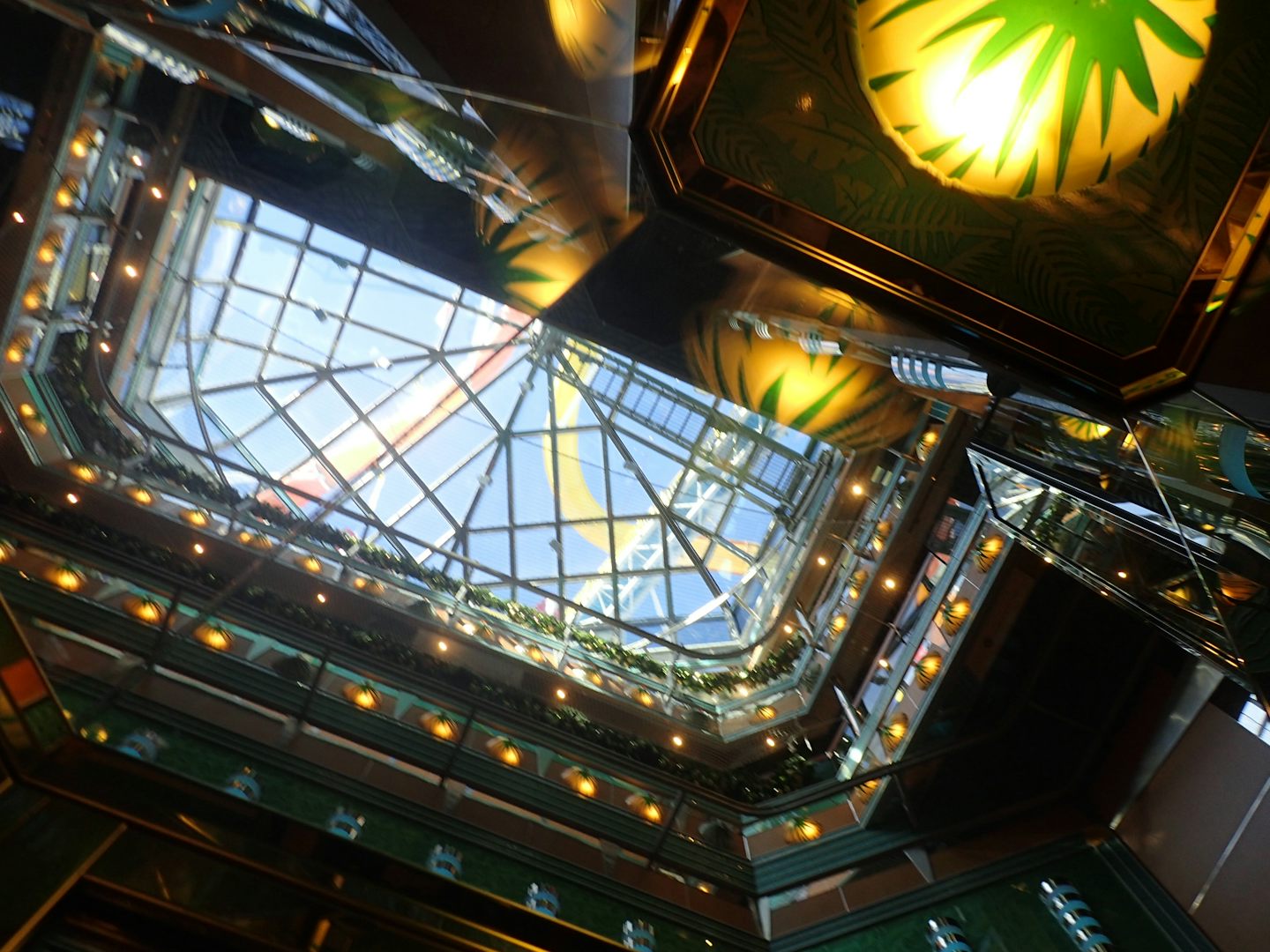 looking up to the top of the ship from inside the lobby