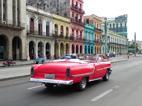 Old Havana - mid day activity and traffic in front of the Capitol.  Historical charm!