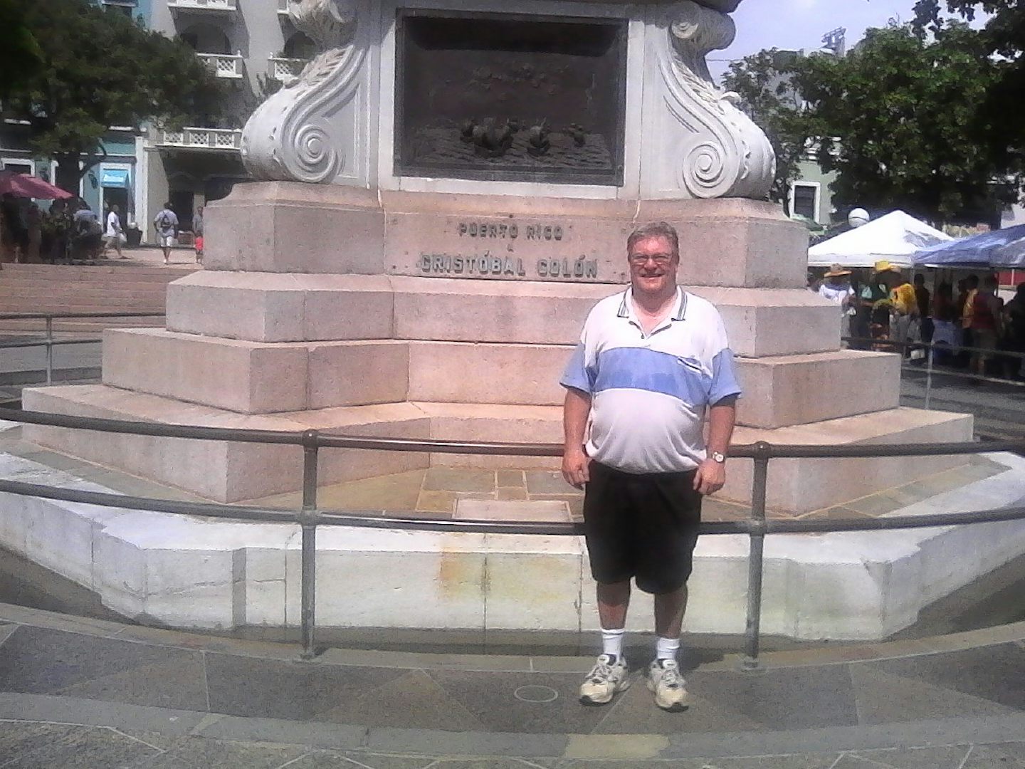 posing in front of the statue and fountain we posed in front of many years