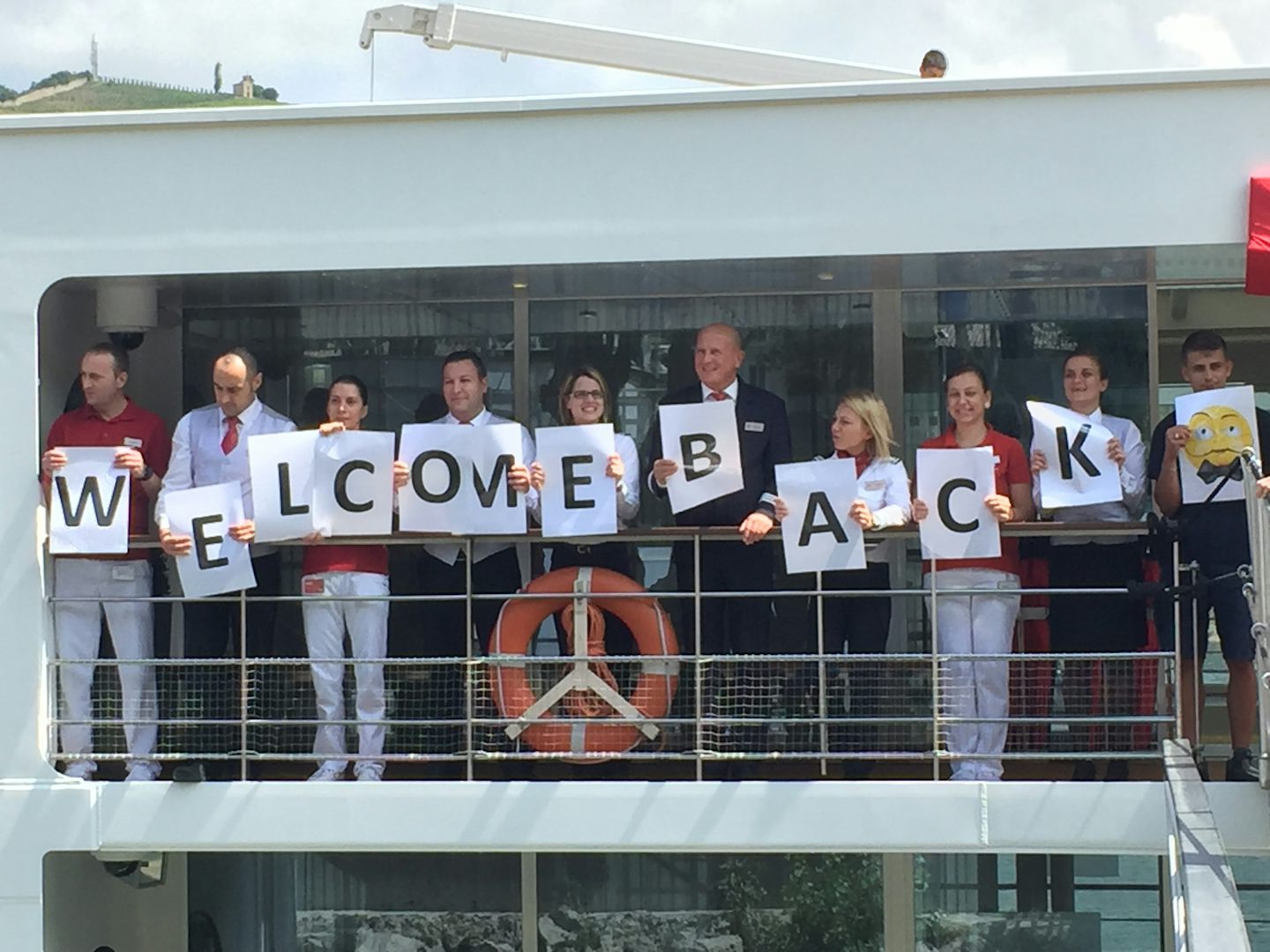 The fantastic crew welcoming us back to the ship after an excursion!