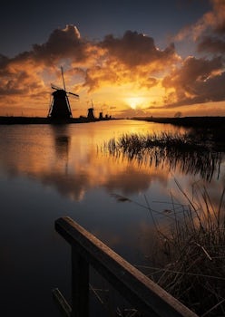 Windmills in Kinderdijk at sunset.  I love windmills.