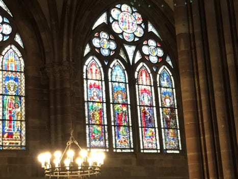 One of several beautiful, stained- glass widow panes inside the Cologne Cat