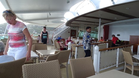 Outdoor seating at the back of the ship