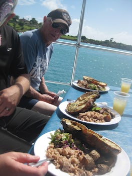 Enjoying a lobster lunch on a Catamaran excursion.