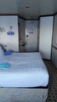 Larger than queen size bed. Note these are new and most comfy beds specially made for Princess and gradually being installed in all ships