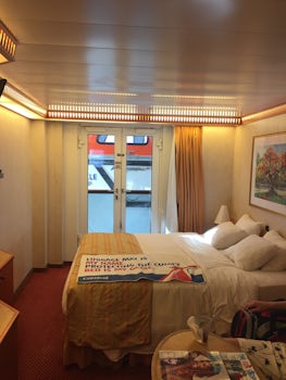 Here is a picture of the 4K interior on the Carnival miracle. Nice room. I would think the room is about the size of a balcony room. Our friends had in interior cabin and it doesn