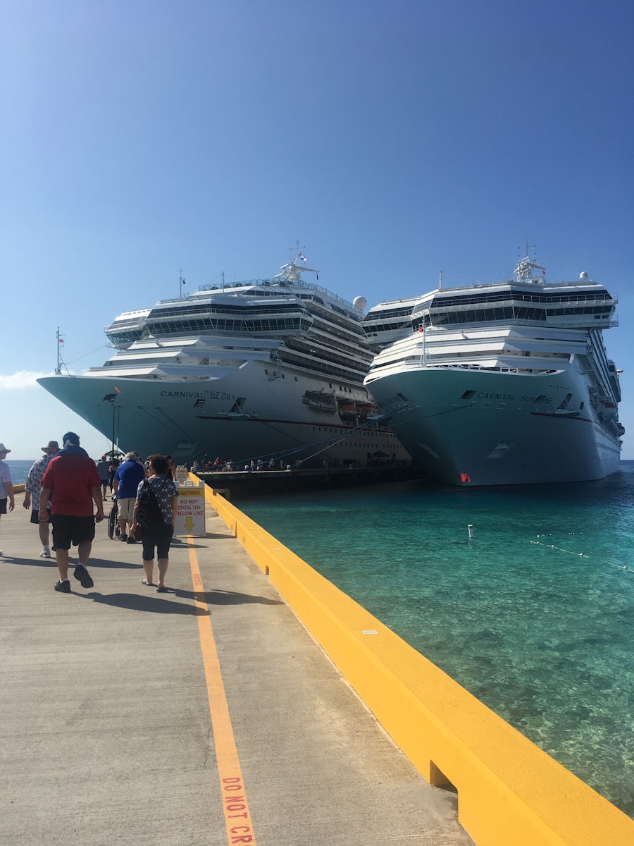 Carnival Sunshine with the Carnival Glory side by side in Grand Turk