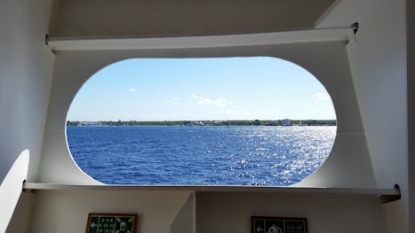 A glimpse of Cozumel while doing our daily laps on Deck Three (Promenade De
