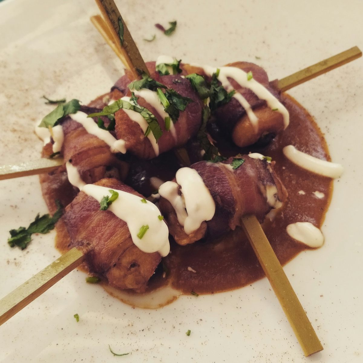 Chicken stuffed jalapenos wrapped with bacon (Sabor)