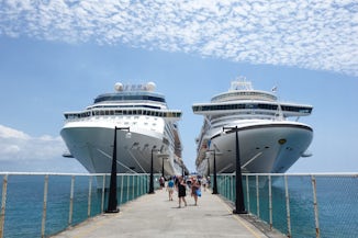 Celebrity Eclipse and Crown Princess side by side at St Kitts