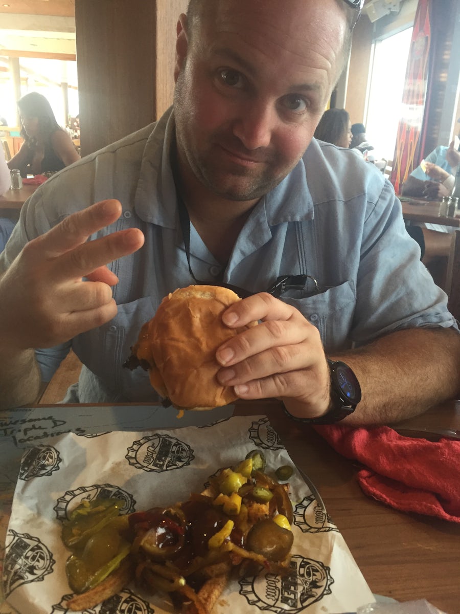 Tearing into one of Guy's Burgers on Carnival Liberty