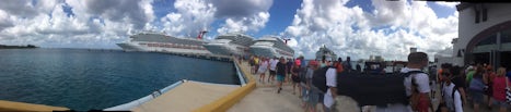 The Freedom docked beside the Glory and the Triumph in Cozumel.