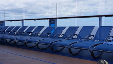 Deck 15, chairs along the jogging track.