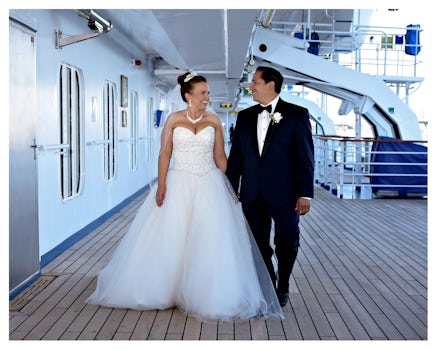 After we got married we had a quick little reception.   Then we had to muster...As we awaited away the photographer took us around the boat for photos.