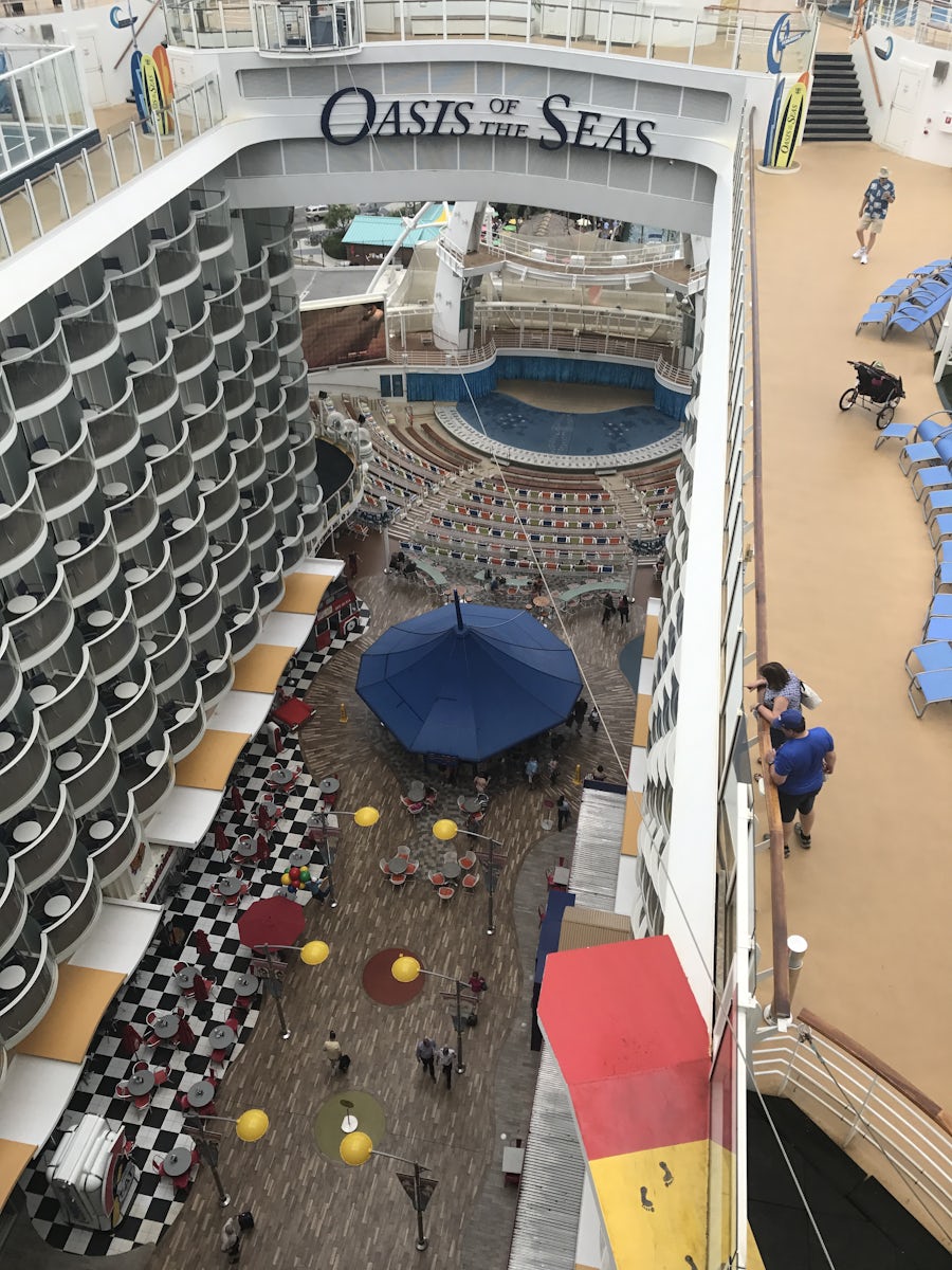 Looking down from balcony, red spot is where zip line folks end the zip