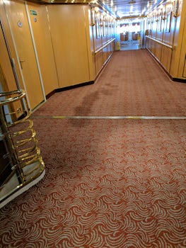 Restaurant entrance, stained carpeting and moldy smell