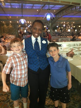 Our favorite server, Denisha, with my grandsons.
(It appears sideways to m