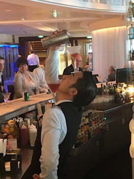 Bartender in the Martini bar performing his tricks