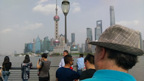Walking on the Bund in Shanghai, China.  So many Chinese people took photos