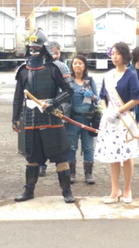 Shogun actor modeling for cruisers as they re-board in Miyazaki.   Cool dud