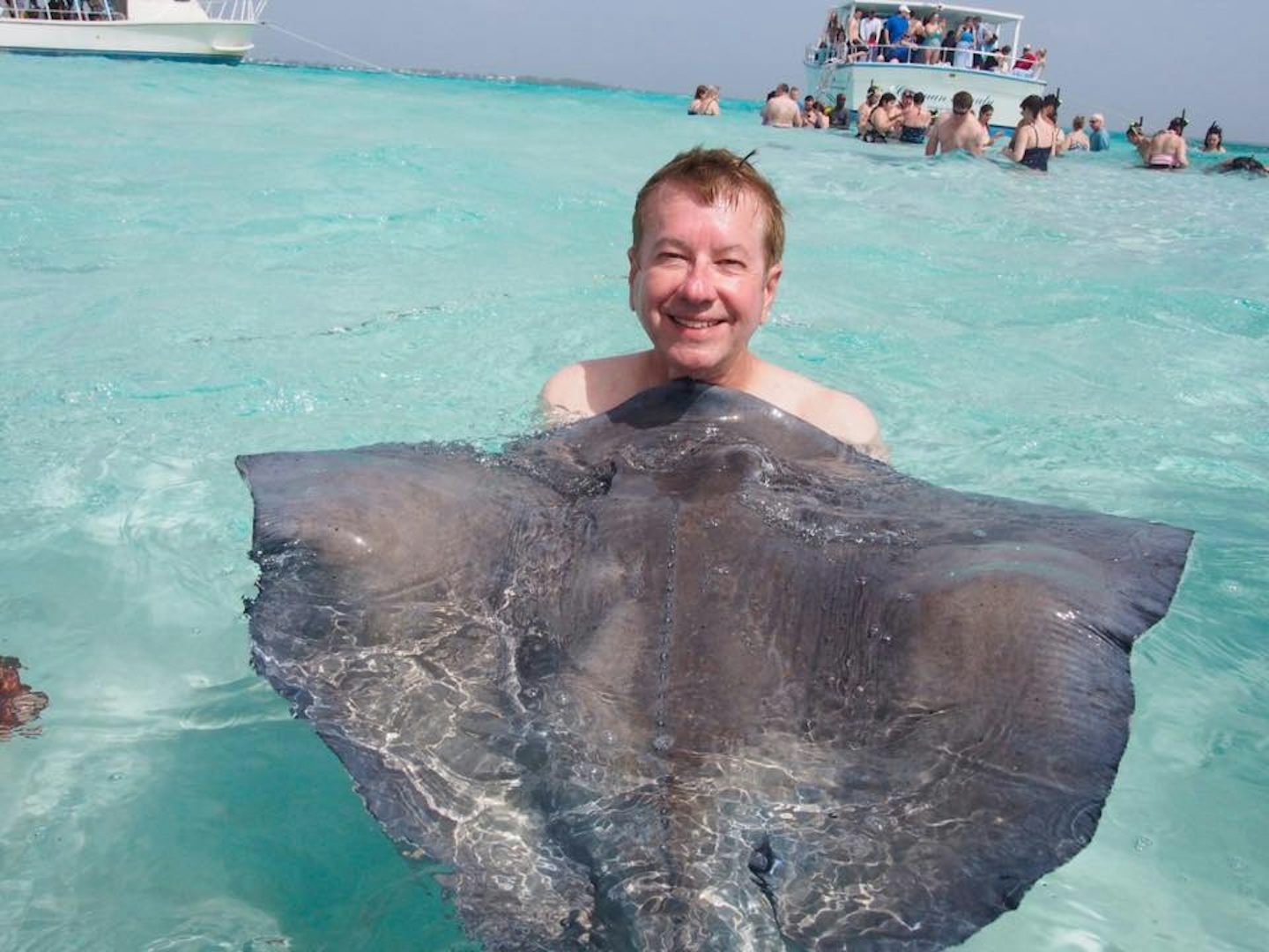 Stingray City in Grand Cayman.  The stingrays are so friendly. some will le