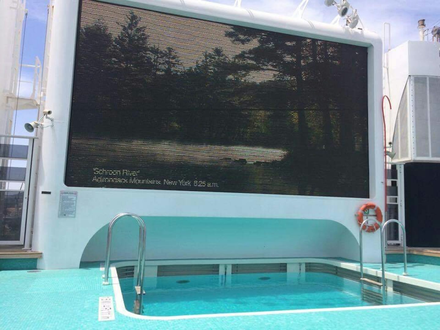Cinema screen at adult pool