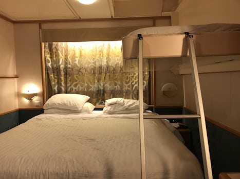 This is a photo of the cabin with the bunk bed open.  Ridiculous!