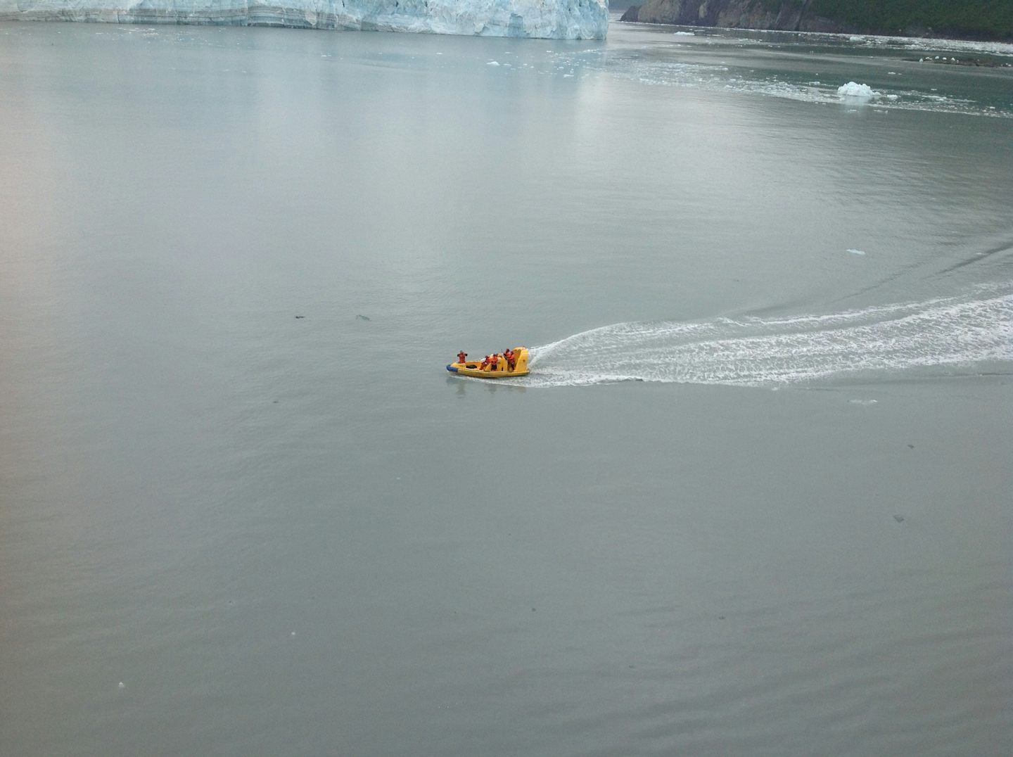 Ships boat taking photos of glacier