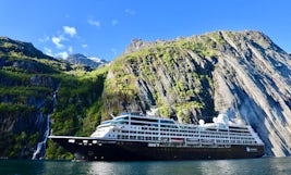 Ship sailing through the fjords