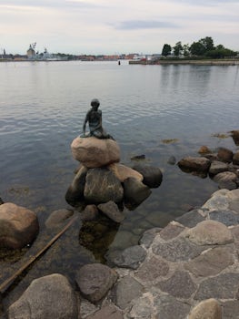 This is the little mermaid statue in Copenhagen, Denmark.