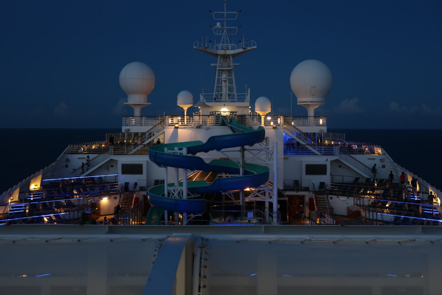 This is a night time photo of the slide located on the Lido deck
