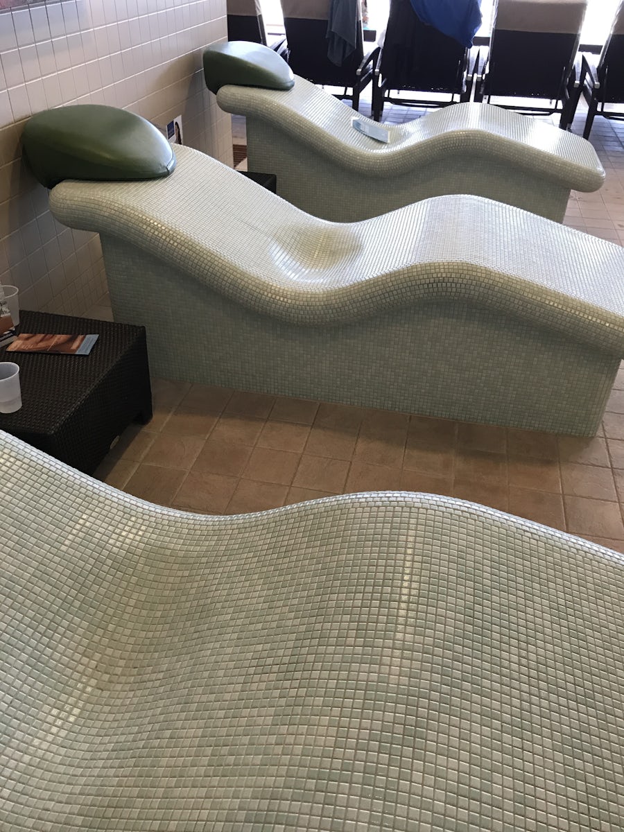 Heated chairs in the thermal suite spa
