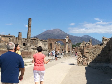 The streets of Pompeii with Mt. Vesuvius looming.