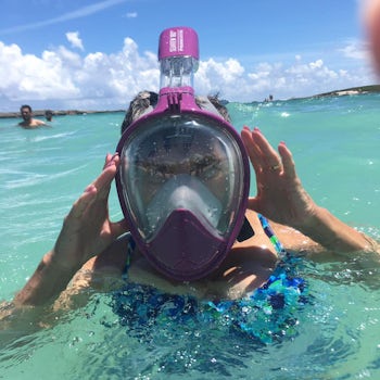 Teach Mom how to snorkel. Coco Cay is clear and shallow and ideal for begin