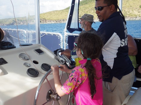 my daughter "driving" the boat since it was her birthday 2 days bef