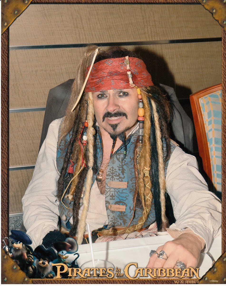 Doing photo dressed as jack sparrow on pirate night Disney magic, main dining room