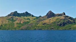 The mountains of Waya Island, Fiji from Nalauwaki Bay at noon.