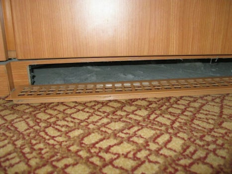 vent grate under the refrigerator cabinet kept falling down to reveal 1+ in