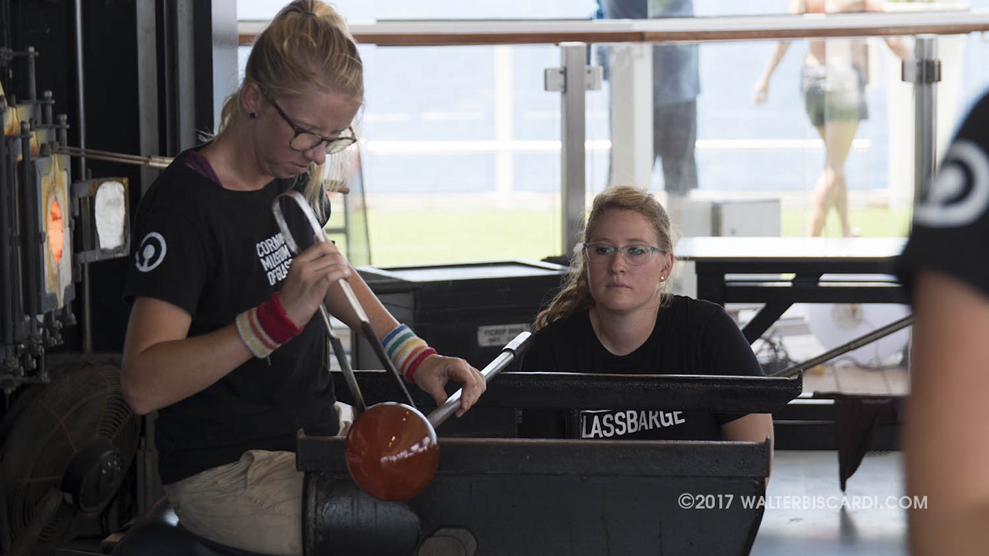 Corning Museum of Glass - Hot Glass Show.  Briana working a piece while Meg