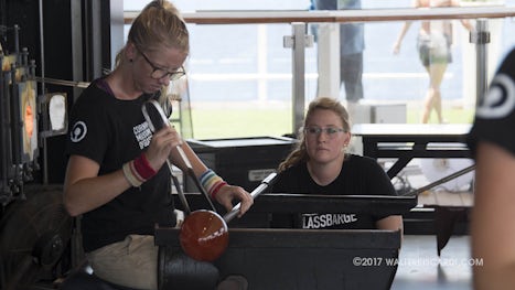 Corning Museum of Glass - Hot Glass Show.  Briana working a piece while Meg