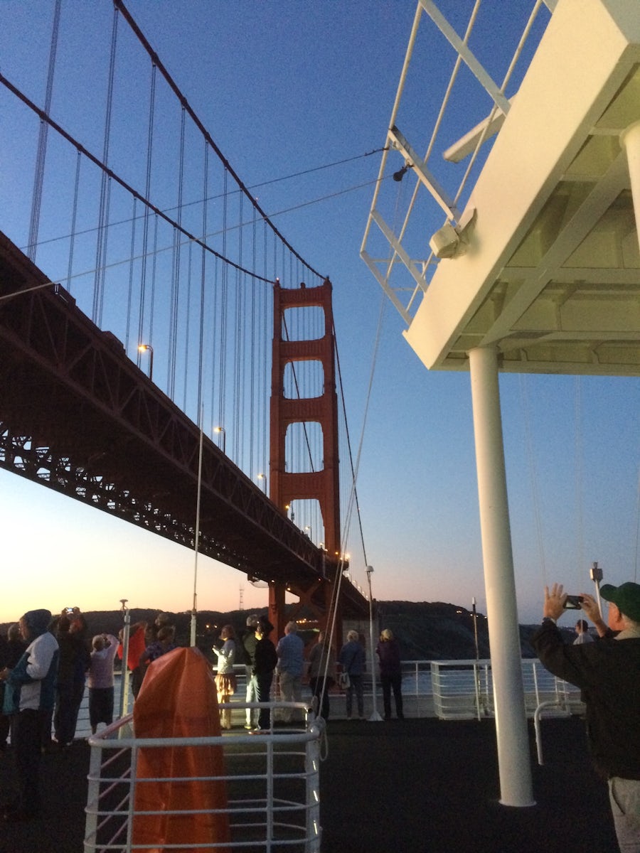 Heading under Golden Gate Bridge at sun rise