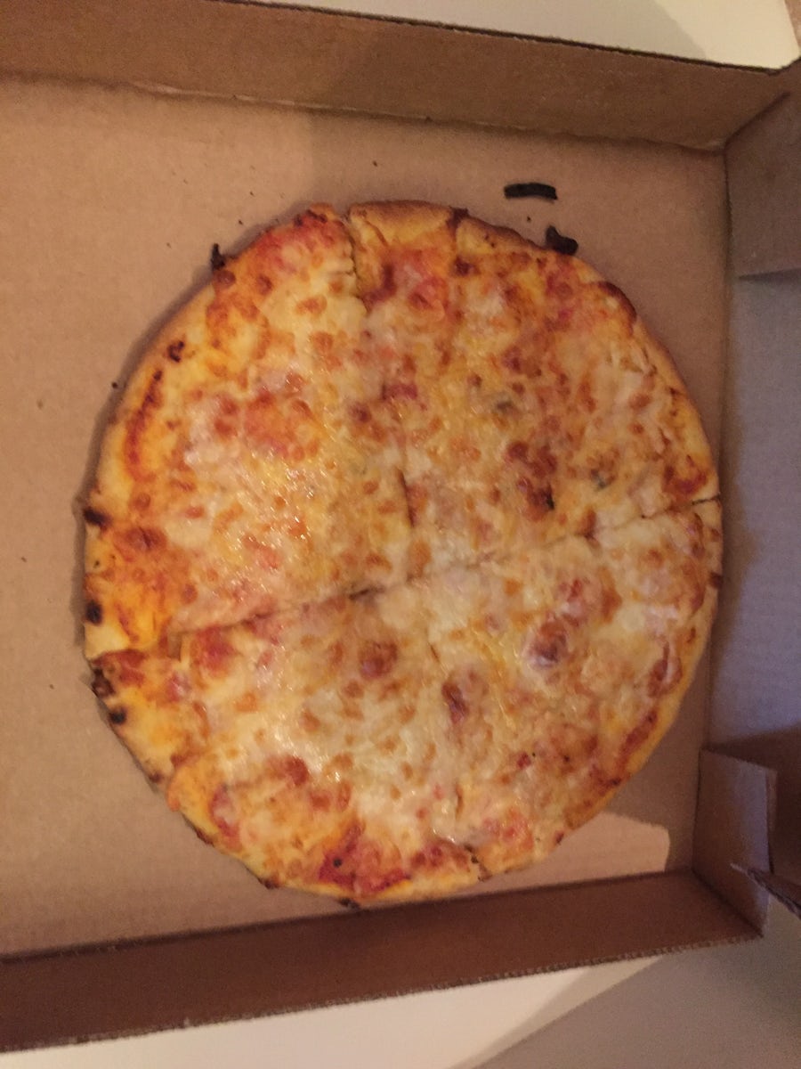 Room service pizza. Tastes like cardboard.