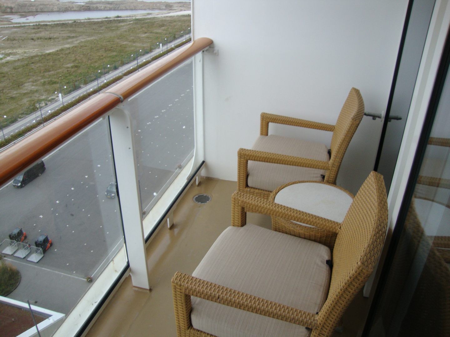 Small balcony, room 16706. Chairs have soft cushions. Good views.