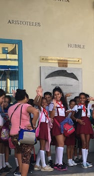 Schoolchildren waving at us in Havana.  All the locals were so friendly