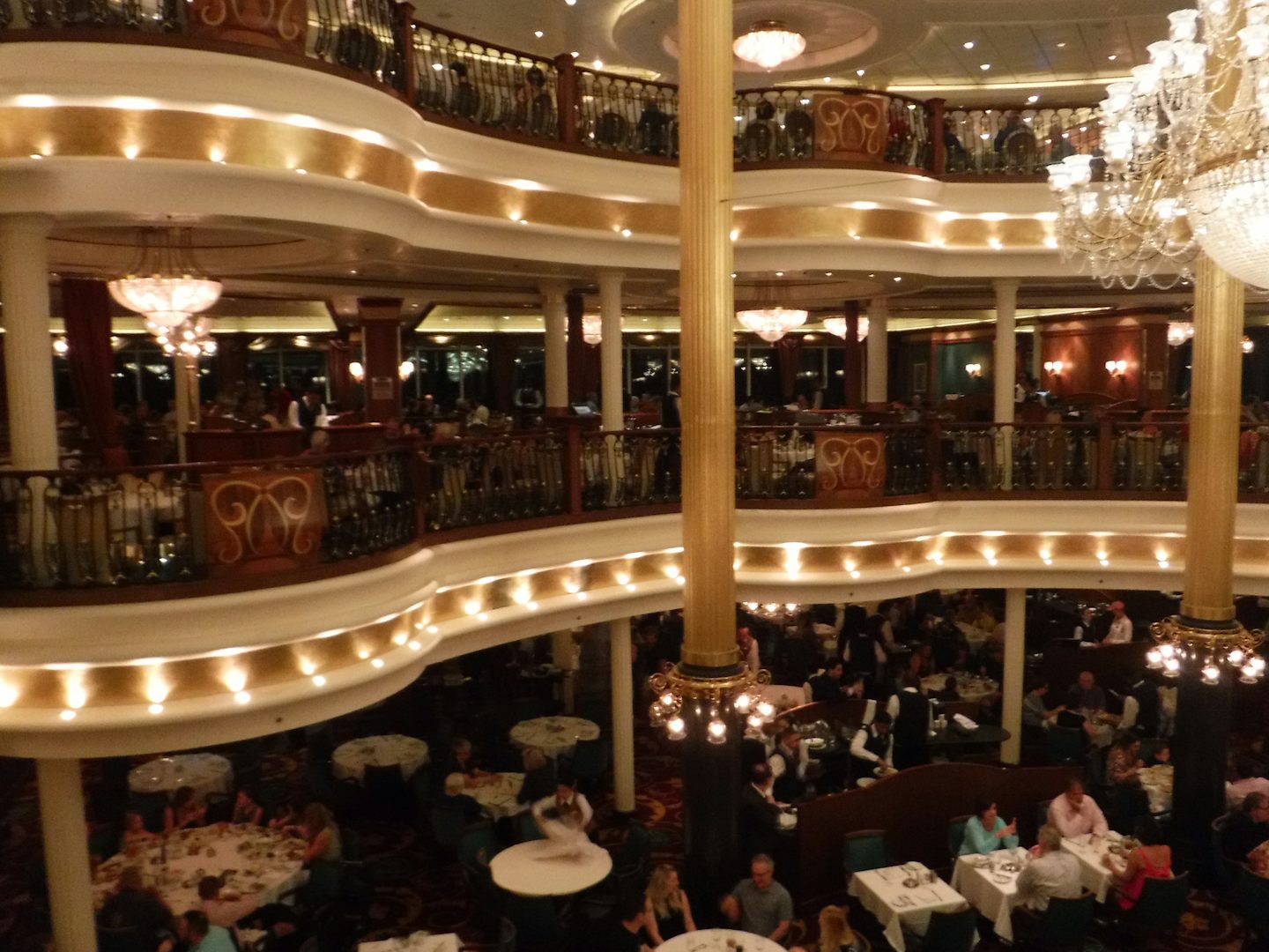 The dinning rooms are located on Decks 3,4 and 5 and are aft.  Depending on